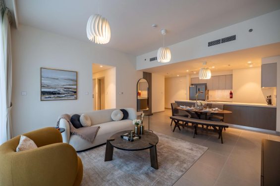 Elegant and spacious open-plan living area in a premium Dubai holiday home.